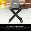 A black folding grill stand is shown in the foreground, with a collage of weather-related images (sun, rain, snow, dust, rust) in the background, illustrating its weather-resistant features. Text below the stand describes its durability. Náhľad obrázku produktu