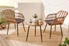 A balcony set with two chairs and a table, decorated with string lights. Produktbild-Vorschau