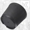 A black Christmas tree stand with a ribbed texture and a circular base with three feet. A white logo is visible in the upper right corner. Voir les images du produit