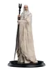 A statue of Saruman the White Wizard from The Lord of the Rings, holding a staff. Produktbild-Vorschau