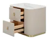 A cream and gold nightstand with two drawers. Náhled obrázku produktu