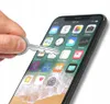 A hand is holding a key and touching a smartphone screen, which displays various app icons. Produktbild-Vorschau