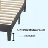 Close-up of a bed frame showing the slatted base and legs, with text indicating under-bed storage height. Produktbild-Vorschau