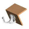 A white adjustable bracket is attached to a corner piece of brown wood, likely representing a gutter system component. Produktbild-Vorschau