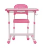A pink and white adjustable desk and chair set for children. Produktbild-Vorschau
