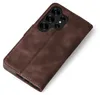 A brown leather flip case for a smartphone is shown from a diagonal angle against a white background. Produktbild-Vorschau