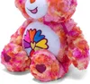 A close-up shot of a colorful plush teddy bear. Anteprima dell’immagine prodotto