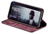 A smartphone in a burgundy flip case is shown open, displaying a movie poster on its screen. Produktbild-Vorschau