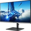 A futuristic spaceship flying through clouds with tall buildings in the background, displayed on a monitor. Produktbild-Vorschau