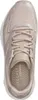 A top-down view of a beige sneaker with silver glitter accents. Voir les images du produit