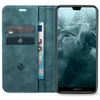 A teal flip-case wallet for a Huawei P20 Lite phone, showing the phone screen and card slots. Produktbild-Vorschau