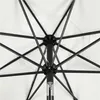 Close-up view of the internal structure of a white umbrella, showing the black metal ribs and central pole. Produktbild-Vorschau