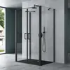 A modern bathroom with a black framed glass shower enclosure. Produktbild-Vorschau