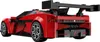A red and black toy supercar with a large rear spoiler, shown from a rear-quarter angle against a white background. Anteprima dell’immagine prodotto