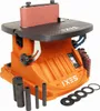 An orange and black oscillating spindle sander with a red sanding belt is shown against a white background. Various sanding drums and discs are placed around the base of the machine. Podgląd zdjęcia produktu