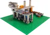 A Lego structure built on a green Lego base plate. Produktbild-Vorschau