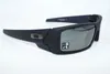 A pair of black Oakley sunglasses on a white background. Náhled obrázku produktu