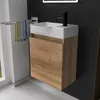 A modern bathroom vanity with a sink and faucet. Produktbild-Vorschau