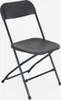 A dark gray plastic folding chair is shown against a light gray background. Anteprima dell’immagine prodotto