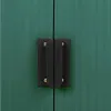 A close-up view of a green metal shed door with a black handle. Produktbild-Vorschau