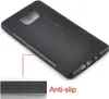 A black phone case is shown from a diagonal angle, highlighting its anti-slip texture. Produktbild-Vorschau