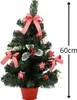 A decorated artificial Christmas tree in a red pot. Náhled obrázku produktu