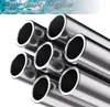 Close-up view of several stainless steel tubes, with text overlay highlighting material quality. Anteprima dell’immagine prodotto