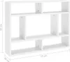 A white shelf unit with multiple compartments. Voir les images du produit