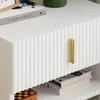 Detailansicht der weißen Wellenfront und des Goldgriffs des SoBuy Nachttisches FBT176-E-W Produktbild-Vorschau