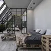 A modern living space with a bedroom visible through a glass partition, featuring pallet furniture and a coffee table. Anteprima dell’immagine prodotto