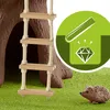 A toy hedgehog sits on green grass next to a treehouse ladder, with a green circle graphic showing a diamond and a shovel. Anteprima dell’immagine prodotto