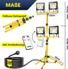 A product image showing a MASKO LED work light with a tripod and remote control, along with various dimensions and labels. Produktbild-Vorschau