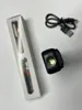 A black LED inspection lamp and its packaging are laid out on a white surface, along with a USB charging cable. Produktbild-Vorschau