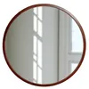 A round mirror with a wooden frame is shown against a white background with light reflections. Produktbild-Vorschau