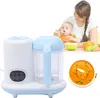 A baby food maker is shown next to a mother feeding her baby, with a bowl of soup in the foreground. Produktbild-Vorschau