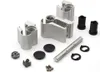 A collection of metal and plastic hardware components, likely for a door or window system, laid out on a white background. Produktbild-Vorschau