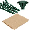 A set of artificial Christmas tree accessories, including green plastic legs, a green plastic top piece, and a brown burlap sack. Anteprima dell’immagine prodotto