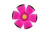 A pink and yellow toy disc that transforms into a ball, shown from a top-down perspective against a white background. Anteprima dell’immagine prodotto
