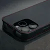 Close-up of a black leather phone case with red stitching, showing the camera cutout. Anteprima dell’immagine prodotto