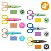 A collection of decorative scissors and decorative paper cutouts. Voir les images du produit