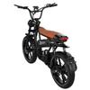 A black electric bicycle with a brown seat is shown from a slightly elevated rear-diagonal angle against a white background. Voir les images du produit