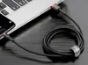 A black braided USB-C charging cable is connected to a smartphone and a laptop. Náhľad obrázku produktu