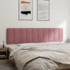 A pink upholstered headboard is mounted on a white wall above a bed with white bedding. Produktbild-Vorschau