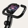 Close-up view of the handlebars and tablet holder of a stationary exercise bike. Anteprima dell’immagine prodotto