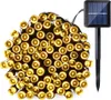 A string of solar-powered LED lights with a solar panel on a stake. Produktbild-Vorschau