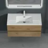 A modern bathroom vanity with a sink and faucet, set against a gray wall and floor. Produktbild-Vorschau