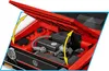 Close-up view of a red toy car engine with the hood open, showing detailed construction. Náhled obrázku produktu