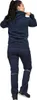 A woman is shown from behind, wearing a navy blue hooded sweatshirt and navy blue work pants with reflective strips. Produktbild-Vorschau