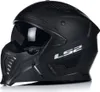 A black modular motorcycle helmet with a dark visor and a distinctive chin guard. Anteprima dell’immagine prodotto