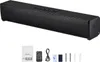 A black soundbar speaker with its accessories laid out below it on a white background. Náhľad obrázku produktu